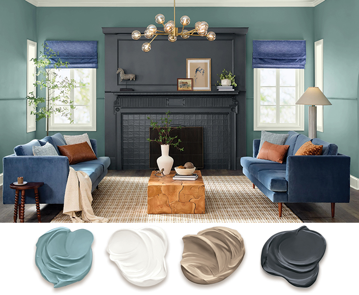 Living room with fireplace, blue couches and coffee table, walls painted Mapped Blue.