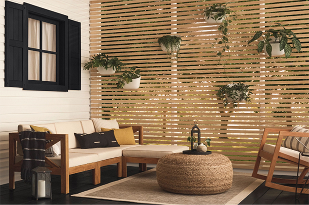 Enclosed porch living area, white siding, True Black trim and floor. Siding is painted the color simplified white.