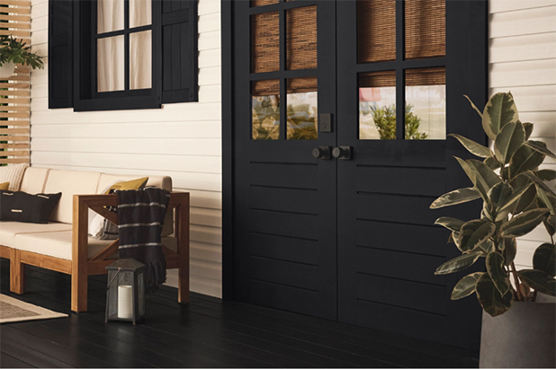 Back porch with True Black French doors, trim and floor. Siding is painted in the color simplified white.