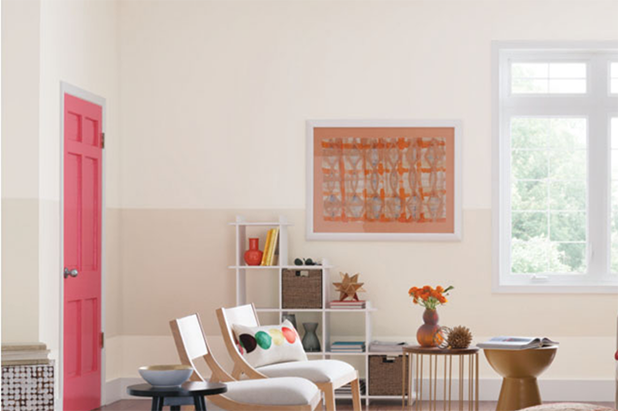 Modern-styled living room a pale colored wall with a beige stripe across it.