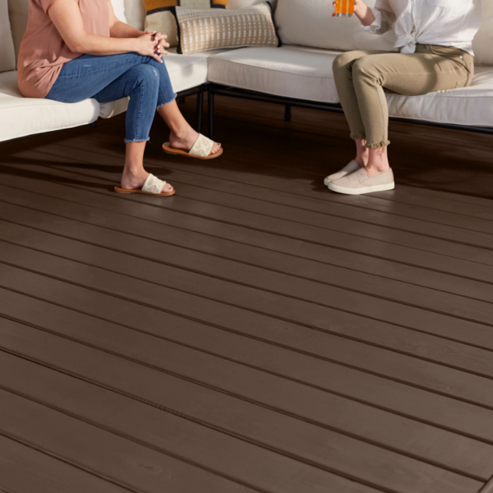 outside decks with two people sitting on couches