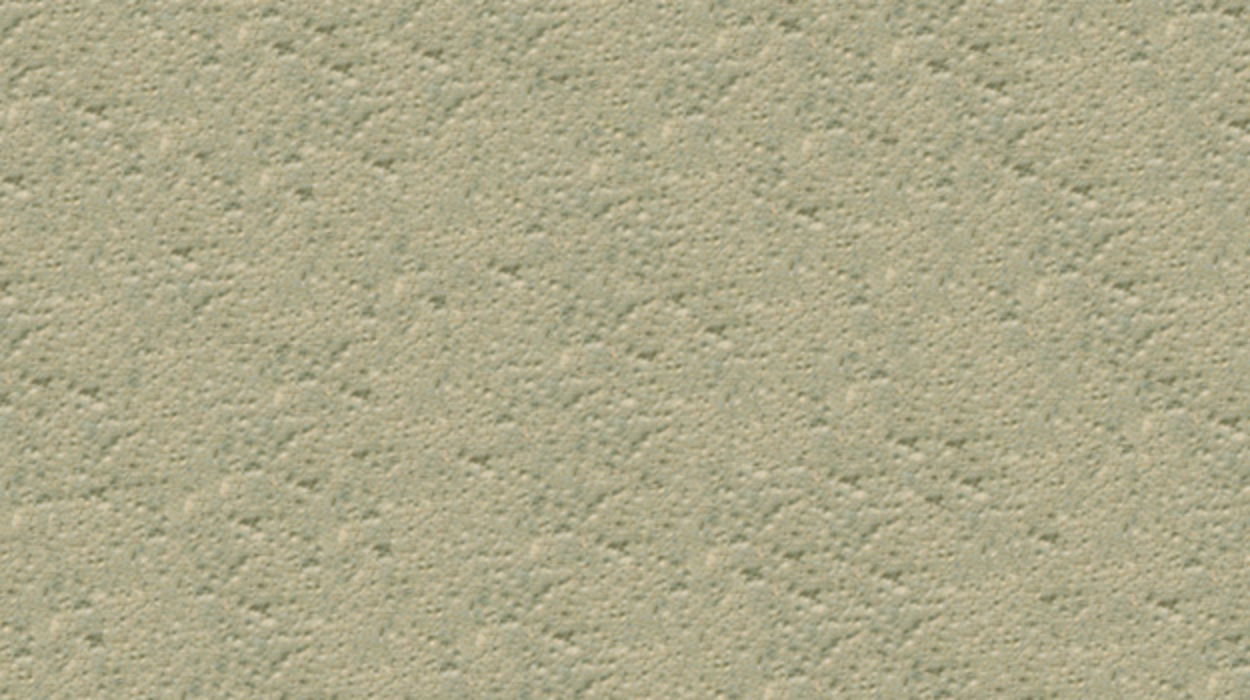 A wall painted light beige long ago is showing signs of moisture and heat blisters.